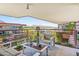 Outdoor patio with comfortable seating, table, and views of the city and mountains at 7131 E Rancho Vista Dr # 7011, Scottsdale, AZ 85251