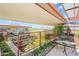 Scenic rooftop patio boasting desert landscaping, greenery, mountain views, and lounge seating at 7131 E Rancho Vista Dr # 7011, Scottsdale, AZ 85251