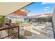 Beautiful rooftop deck with sleek design, lounging chairs, comfortable sofa and arid landscaping at 7131 E Rancho Vista Dr # 7011, Scottsdale, AZ 85251