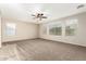 Spacious bedroom with large windows providing natural light and neutral color palette at 7220 W Ashby Dr, Peoria, AZ 85383