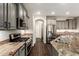 Modern kitchen with stainless steel appliances, granite countertops, and a large island at 7220 W Ashby Dr, Peoria, AZ 85383