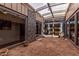 Unique home atrium with a glass ceiling and walls, creating a bright, indoor-outdoor space at 7604 N 46Th Ave, Glendale, AZ 85301