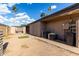 Cozy backyard with block fencing, desert landscaping, and partial shade at 7604 N 46Th Ave, Glendale, AZ 85301