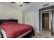 Bedroom featuring a ceiling fan and closet at 7604 N 46Th Ave, Glendale, AZ 85301