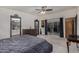 Comfortable main bedroom with backyard access, stylish dresser and adjoining bathroom at 7604 N 46Th Ave, Glendale, AZ 85301