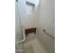 Modern walk-in shower with marble tile, a built-in niche and a fold down bench seat at 7750 E Broadway Rd # 604, Mesa, AZ 85208