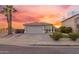 Charming single-story home with a well-manicured front yard and a two-car garage at 7838 N 110 Ln, Glendale, AZ 85307