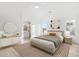 Bright main bedroom featuring an ensuite bathroom and calming contemporary decor at 7838 N 110 Ln, Glendale, AZ 85307
