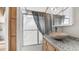 Bathroom featuring granite countertop, vessel sink, and glass shower doors at 786 Cinnabar Dr, Apache Junction, AZ 85119