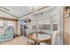 Eat-in dining area with a cozy window nook, wood floors, and a sliding door to the patio at 786 Cinnabar Dr, Apache Junction, AZ 85119