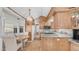 Kitchen and dining area are conveniently located next to each other with a window view and lots of storage at 786 Cinnabar Dr, Apache Junction, AZ 85119