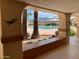 Shaded pool view with palm trees and mountain views in the distance at 786 Cinnabar Dr, Apache Junction, AZ 85119