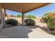 Backyard features a covered patio and desert landscaping at 10431 E Morning Star Dr, Scottsdale, AZ 85255