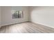 Bedroom with large window, light paint, and vinyl flooring at 10431 E Morning Star Dr, Scottsdale, AZ 85255