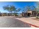 Exterior view of the community clubhouse, showcasing its welcoming entrance and desert landscaping at 10431 E Morning Star Dr, Scottsdale, AZ 85255
