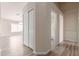Hallway with a closet, access to the bathroom, and neutral paint at 10431 E Morning Star Dr, Scottsdale, AZ 85255