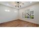 Bedroom with a large window and shutter blinds with natural light at 11143 E Onyx Ct, Scottsdale, AZ 85259