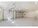 Spacious three car garage with epoxy floors and overhead storage at 11143 E Onyx Ct, Scottsdale, AZ 85259