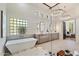 Beautiful primary bathroom features a glass enclosed shower, soaking tub, and dual sinks at 11143 E Onyx Ct, Scottsdale, AZ 85259