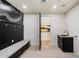 A mudroom with custom cabinets, bench, and direct access to outdoors at 11143 E Onyx Ct, Scottsdale, AZ 85259
