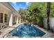 Inviting swimming pool and rock hot tub offer a serene backyard oasis at 11143 E Onyx Ct, Scottsdale, AZ 85259