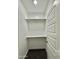 A bright walk-in closet with shelving at 11216 W Apache St, Avondale, AZ 85323