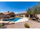 Gorgeous backyard pool with well manicured landscaping surrounding a private home at 1245 E Emile Zola Ave, Phoenix, AZ 85022