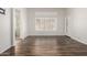 Empty bedroom with wood floors, lots of natural light and ensuite bathroom at 1245 E Emile Zola Ave, Phoenix, AZ 85022