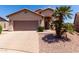 Inviting single-Gathering home featuring a desert landscape and a two-car garage for ample parking at 1245 E Emile Zola Ave, Phoenix, AZ 85022