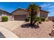 Attractive single-Gathering house featuring a well-kept yard and convenient two-car garage at 1245 E Emile Zola Ave, Phoenix, AZ 85022
