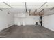 Spacious garage with ample storage cabinets and an organized workbench area at 1245 E Emile Zola Ave, Phoenix, AZ 85022