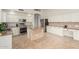 Spacious kitchen with granite countertops, stainless steel appliances, and a center island at 1245 E Emile Zola Ave, Phoenix, AZ 85022