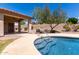 Stunning pool and covered patio area, perfect for relaxation and outdoor entertainment at 1245 E Emile Zola Ave, Phoenix, AZ 85022