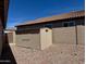 Durable backyard shed in a gravel-covered yard, offering extra storage at 1245 E Emile Zola Ave, Phoenix, AZ 85022