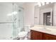 This bathroom features a standing shower and a dark vanity at 12838 W Desert Mirage Dr, Peoria, AZ 85383
