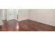 This bedroom features hardwood floors and natural light at 12838 W Desert Mirage Dr, Peoria, AZ 85383