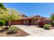 Well-maintained home with a two-car garage, desert landscaping, and inviting curb appeal at 12838 W Desert Mirage Dr, Peoria, AZ 85383