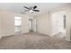 Large main bedroom with ample room and access to the bath and walk-in closet at 12838 W Desert Mirage Dr, Peoria, AZ 85383