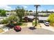 Aerial view of a home on a cul-de-sac with manicured lawns, mature trees and well-maintained landscaping at 1329 E Catalina Dr, Phoenix, AZ 85014