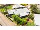 Aerial view of a property featuring a well-maintained backyard, covered patio, and lush landscaping at 1329 E Catalina Dr, Phoenix, AZ 85014