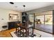 Cozy dining area with modern lighting and patio access, perfect for indoor-outdoor entertaining at 1329 E Catalina Dr, Phoenix, AZ 85014