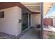 Welcoming home entrance featuring a modern glass door, house number, and stone accents at 1329 E Catalina Dr, Phoenix, AZ 85014