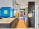 Modern kitchen with stainless steel appliances, granite counters, and an island with a gas cooktop at 1329 E Catalina Dr, Phoenix, AZ 85014