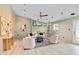Bright living room with white furniture, ceiling fan, recessed lighting, and large windows at 1329 E Catalina Dr, Phoenix, AZ 85014