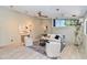 Spacious living room featuring a white couch, modern decor, and ample natural light at 1329 E Catalina Dr, Phoenix, AZ 85014