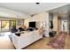 Spacious living room featuring modern furniture and access to the patio at 1329 E Catalina Dr, Phoenix, AZ 85014