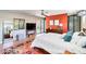 The main bedroom features a glass door to the yard and a sleek, minimalist design at 1329 E Catalina Dr, Phoenix, AZ 85014