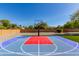 Full basketball court surrounded by landscaping at 14107 W Christy Dr, Surprise, AZ 85379