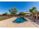 Refreshing pool with waterfall feature at 14107 W Christy Dr, Surprise, AZ 85379
