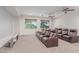 Spacious home theater featuring tiered seating with plush, reclining leather chairs and large projection screen at 14107 W Christy Dr, Surprise, AZ 85379